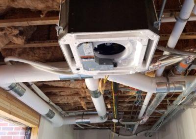 Installed mini split ceiling heads and linear boots to the ductwork at St. John s Church in Valley 3