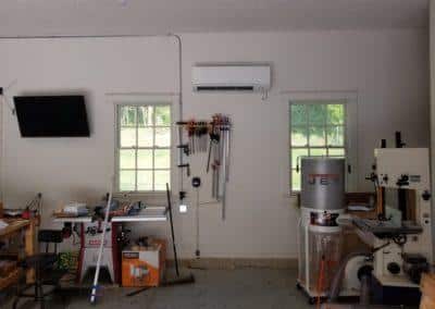 Installing a mini split system to heat and cool a customer s garage the homeowner can now woodwork in his garage all year long comfortably 3