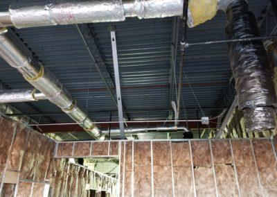 Installing ductwork for Amazing Massage business 2 scaled