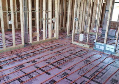 installing infloor heating insulation is laid down and before and after the tubing is laid down the flooring will be laid over the top 1