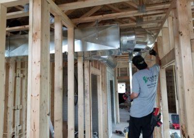 new construction home metal building installing ductwork heating and cooling system and infloor heat