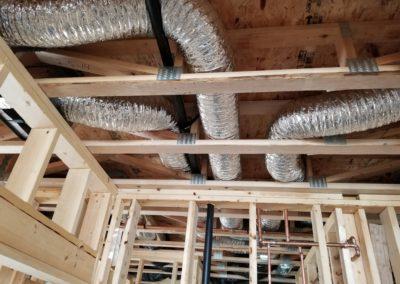 new construction lake home duct work infloor heat geothermal gas lines garage heate